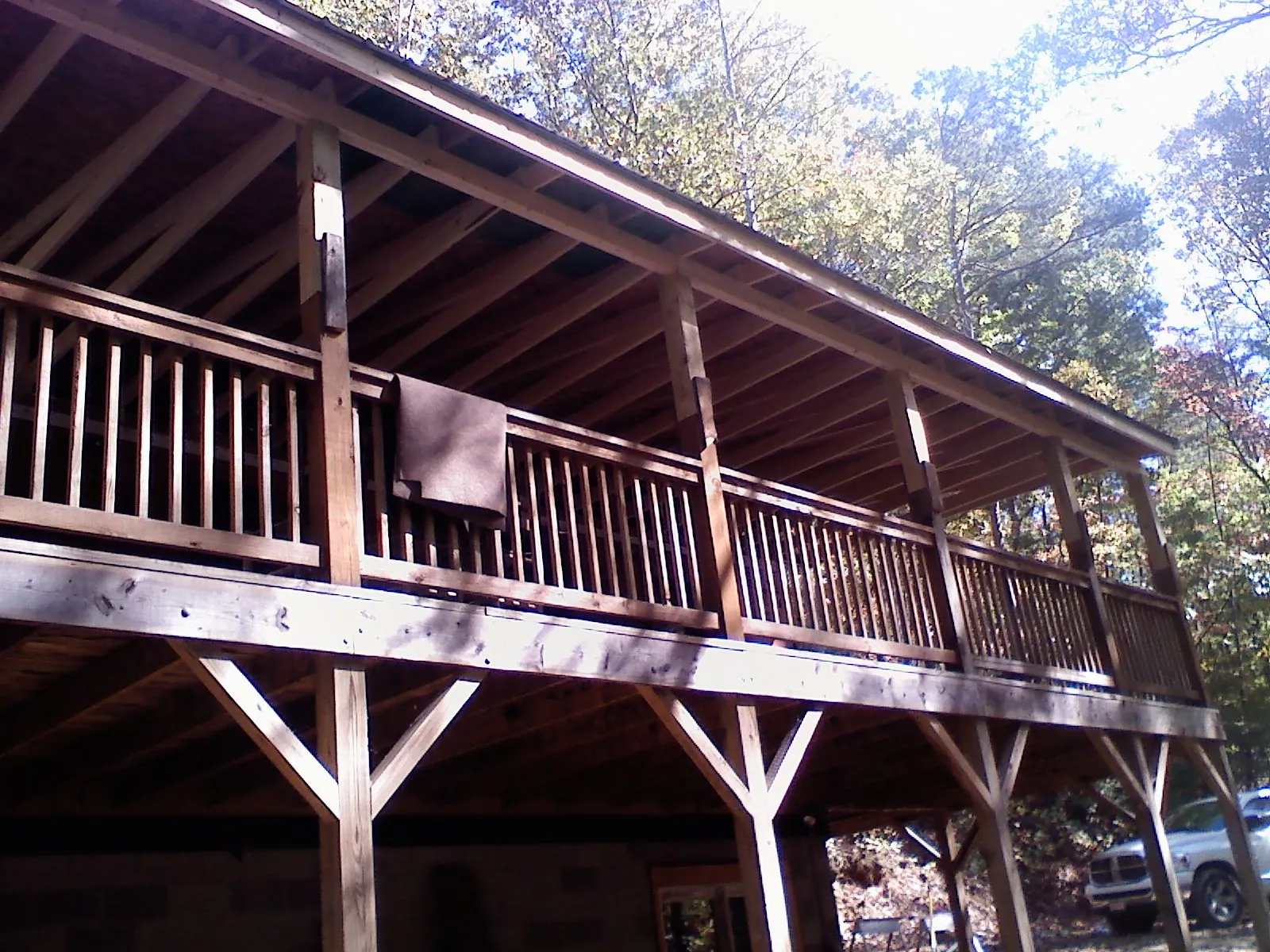 Timber framing under a new elevated porch and deck — Roof Leak Repair in Aplington by Roofing Brothers